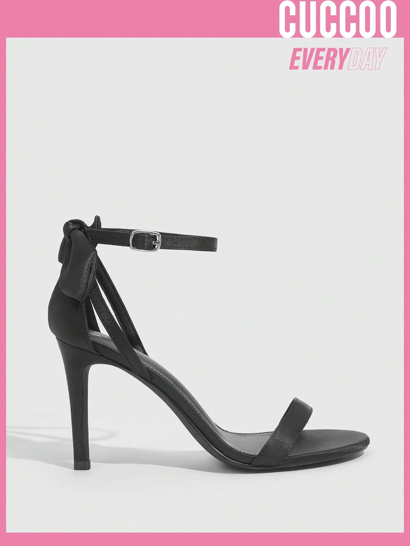 Black high heel sandals with bow detail for spring and summer.