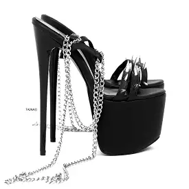 Black high heel sandals with long chain laces.