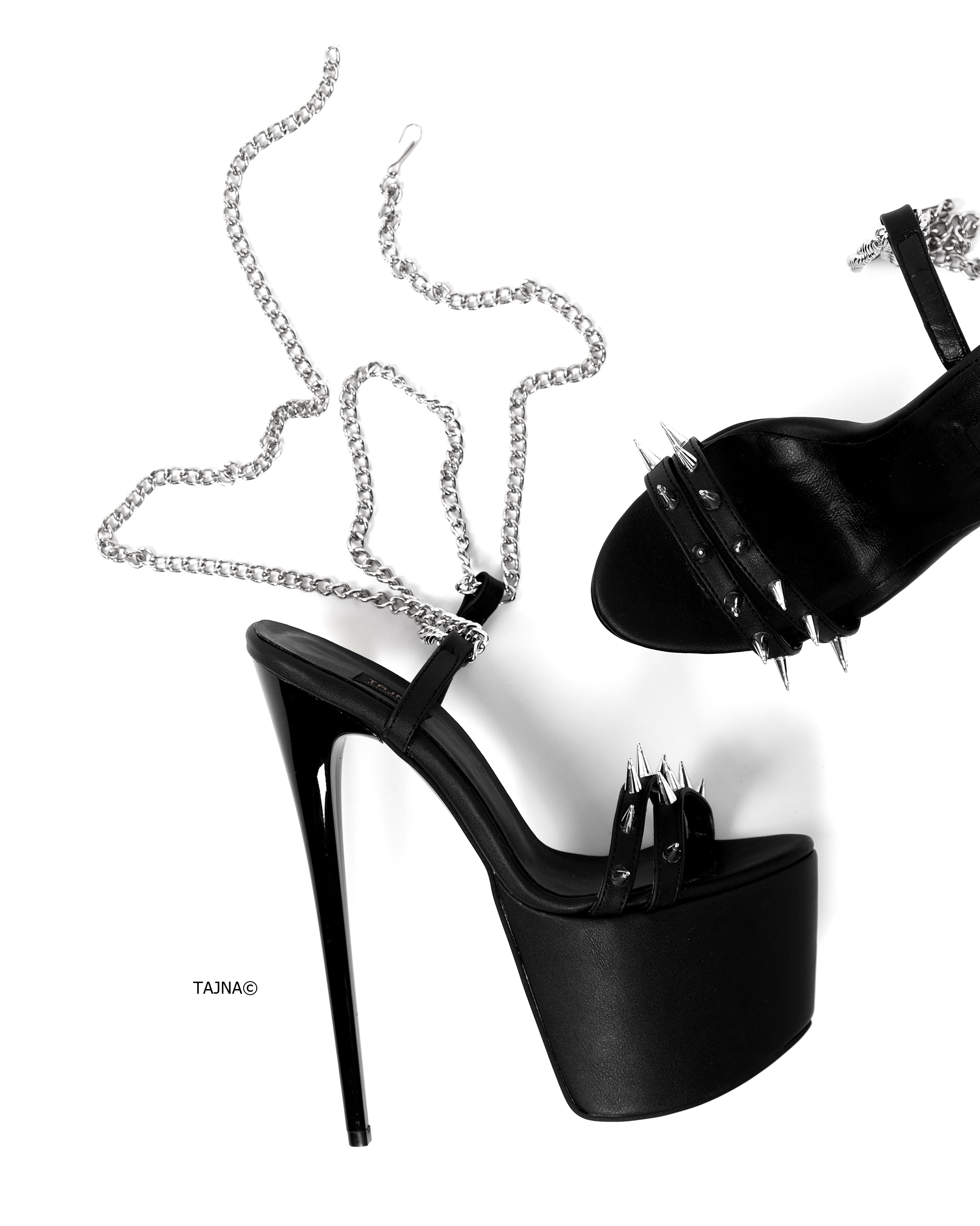 Black high heel sandals with long chain laces.