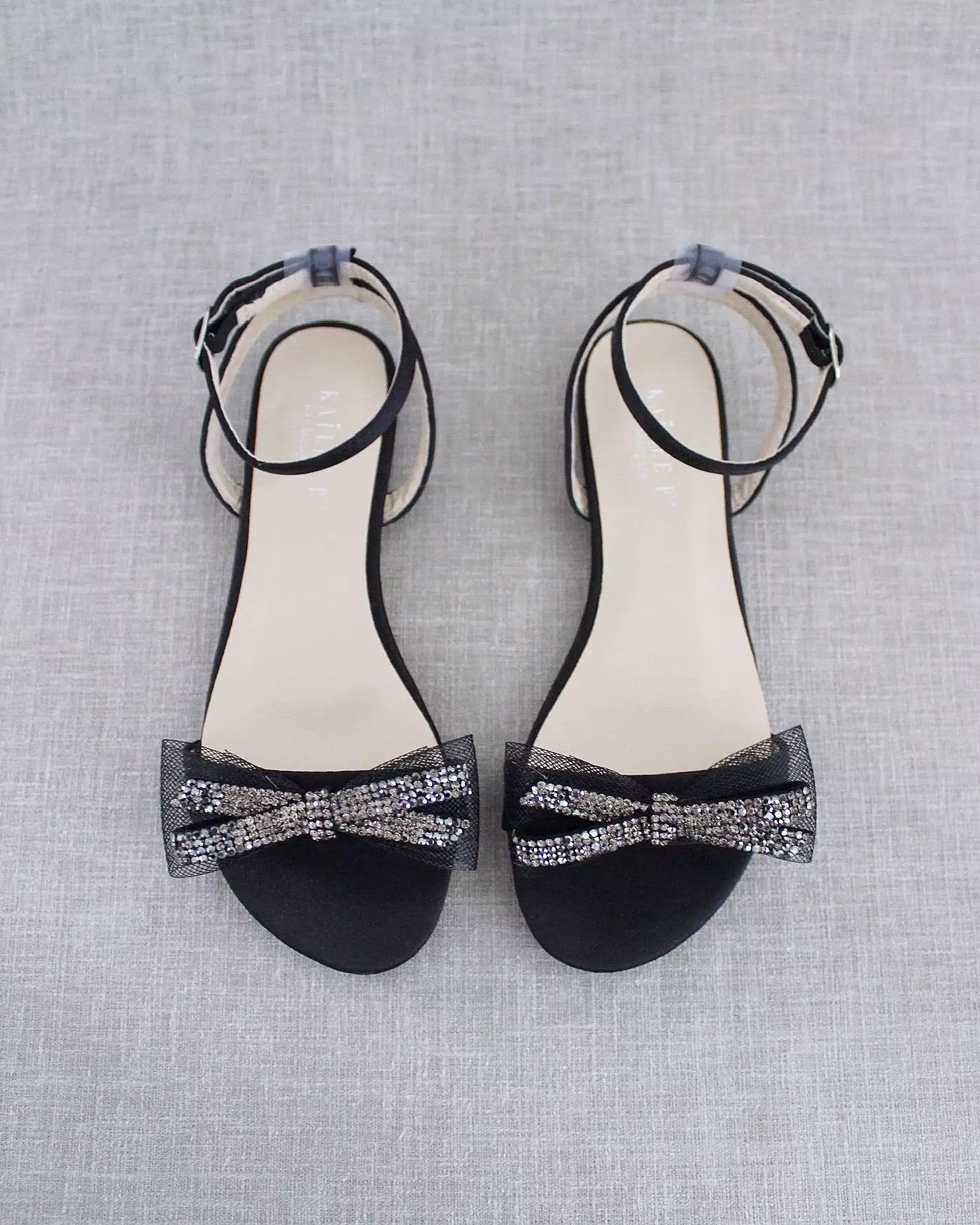 Black Satin Flat Sandal with Sparkling Rhinestone Bow and Ankle Strap