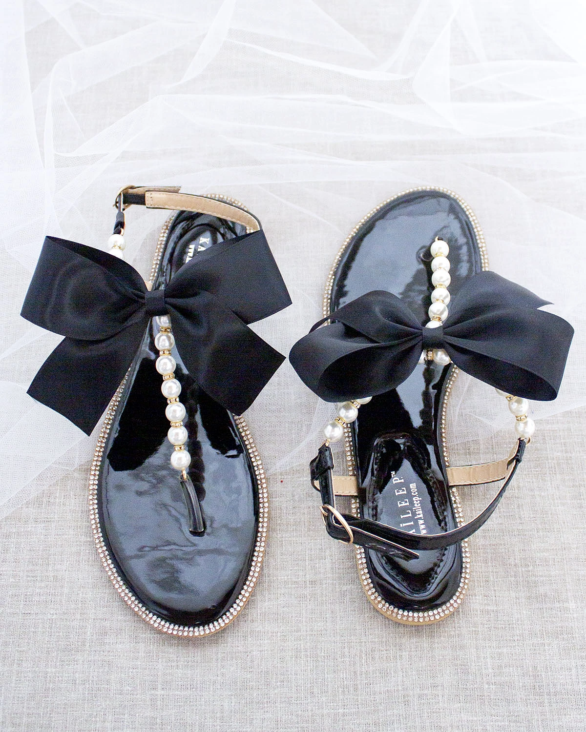 Black T-Strap Pearl Sandals with Rhinestone Embellishments and Large Satin Bow