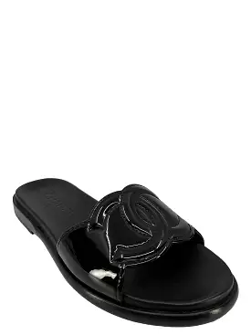 Chanel size 7 black leather sandals.