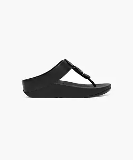 FitFlop black sandals with metallic trim and toe post