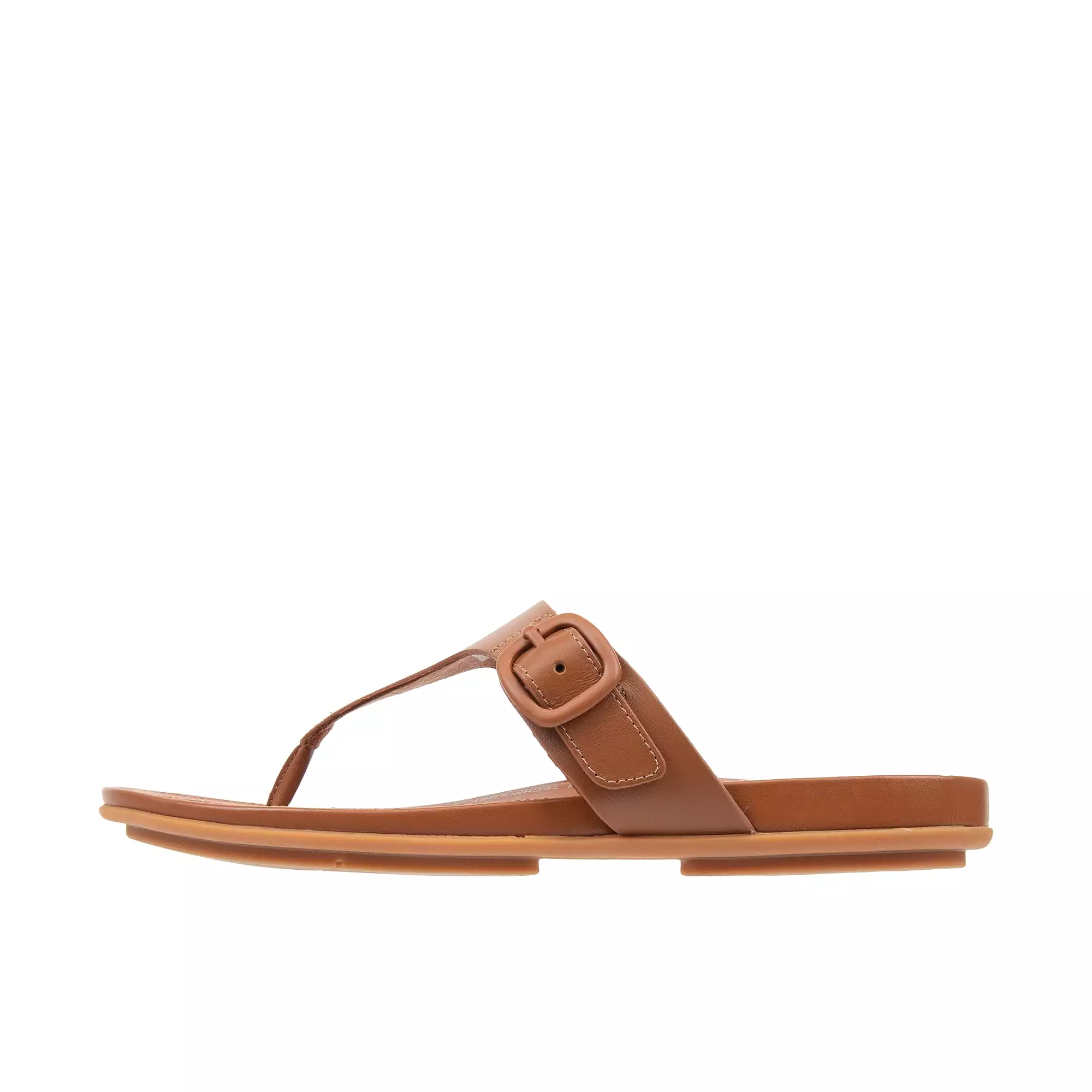 FitFlop Gracie women's rubber-buckle leather toe post sandals in light tan.