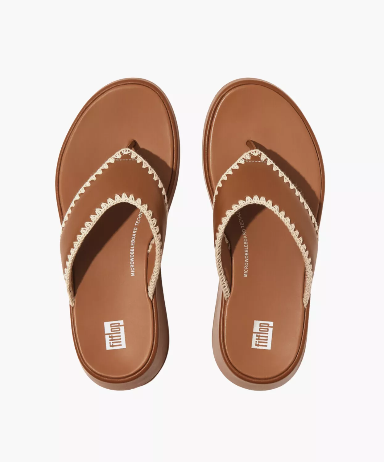 FitFlop leather flatform toe-thongs in tan.