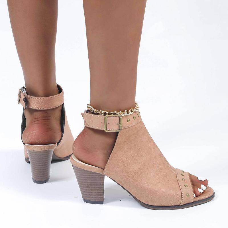 Rivet peep toe sandals with adjustable buckle and chunky heel.