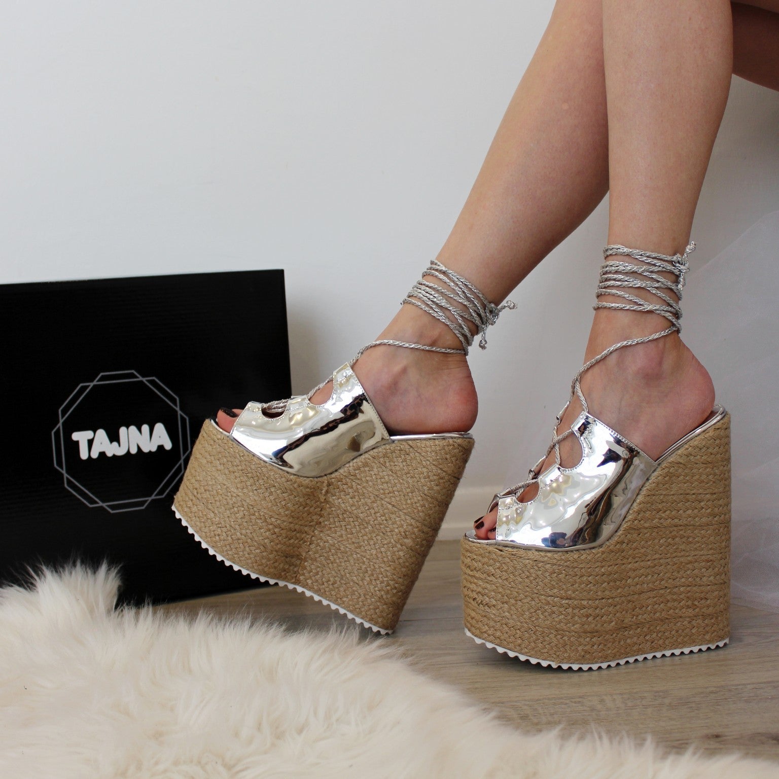 Silver wedge sandals with lace-up platform