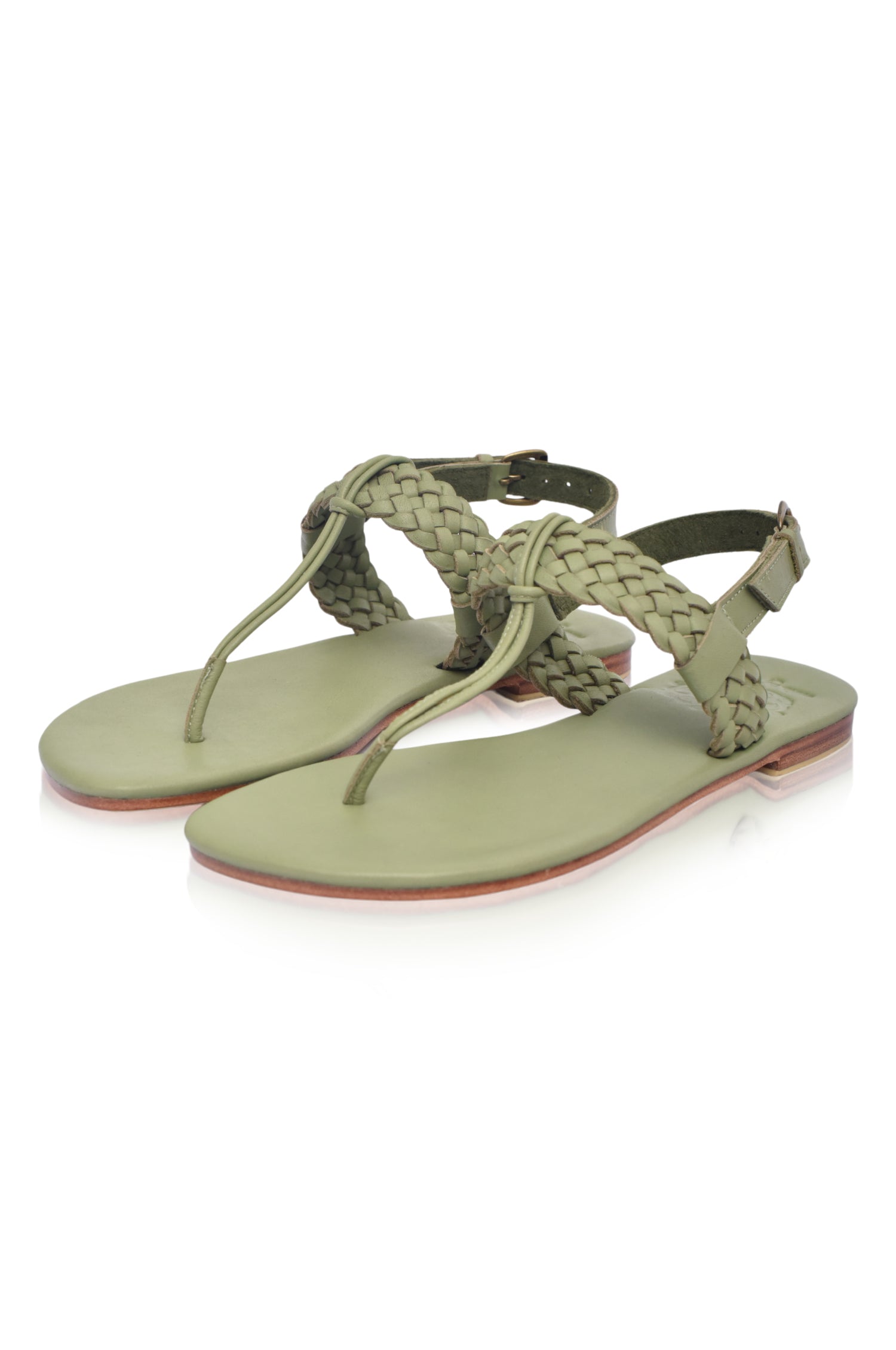 Venetian leather sandals with T-strap design.