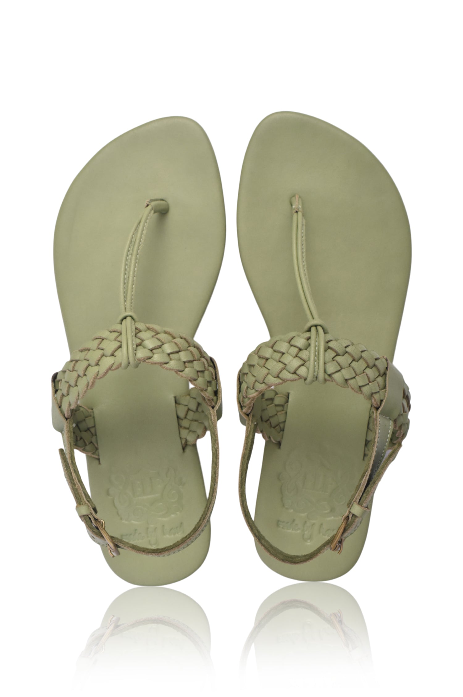 Venetian leather sandals with T-strap design.