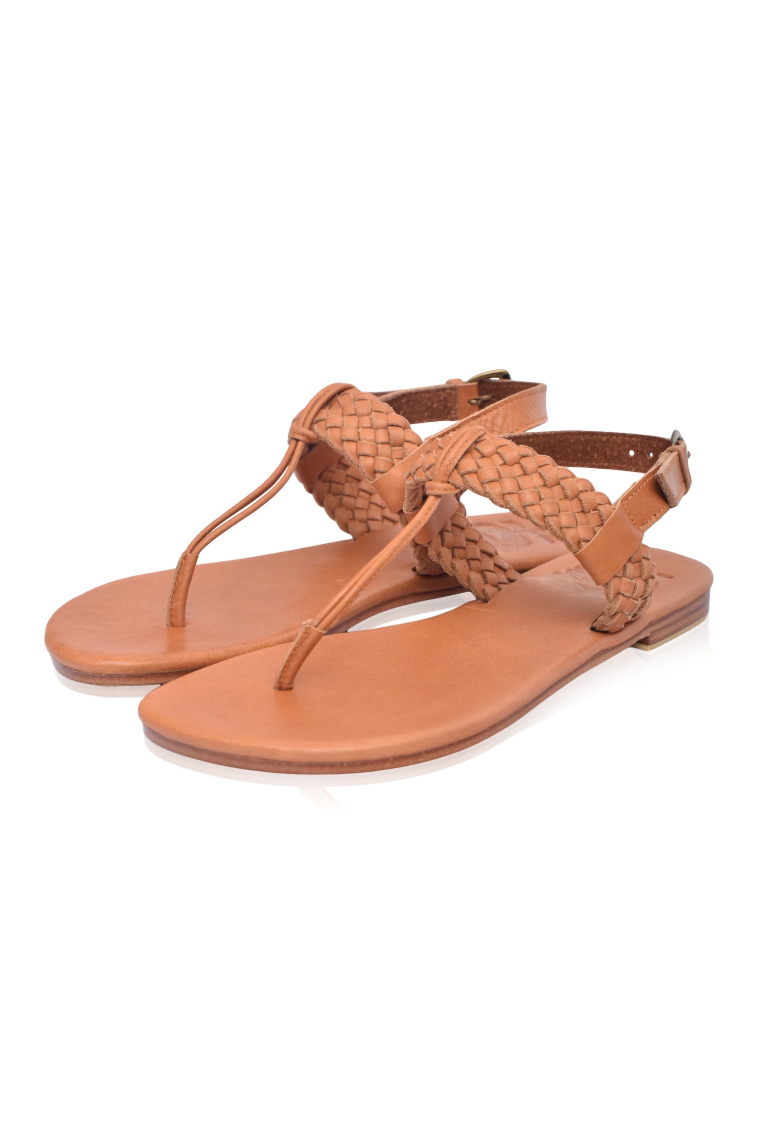 Venetian leather sandals with T-strap design.