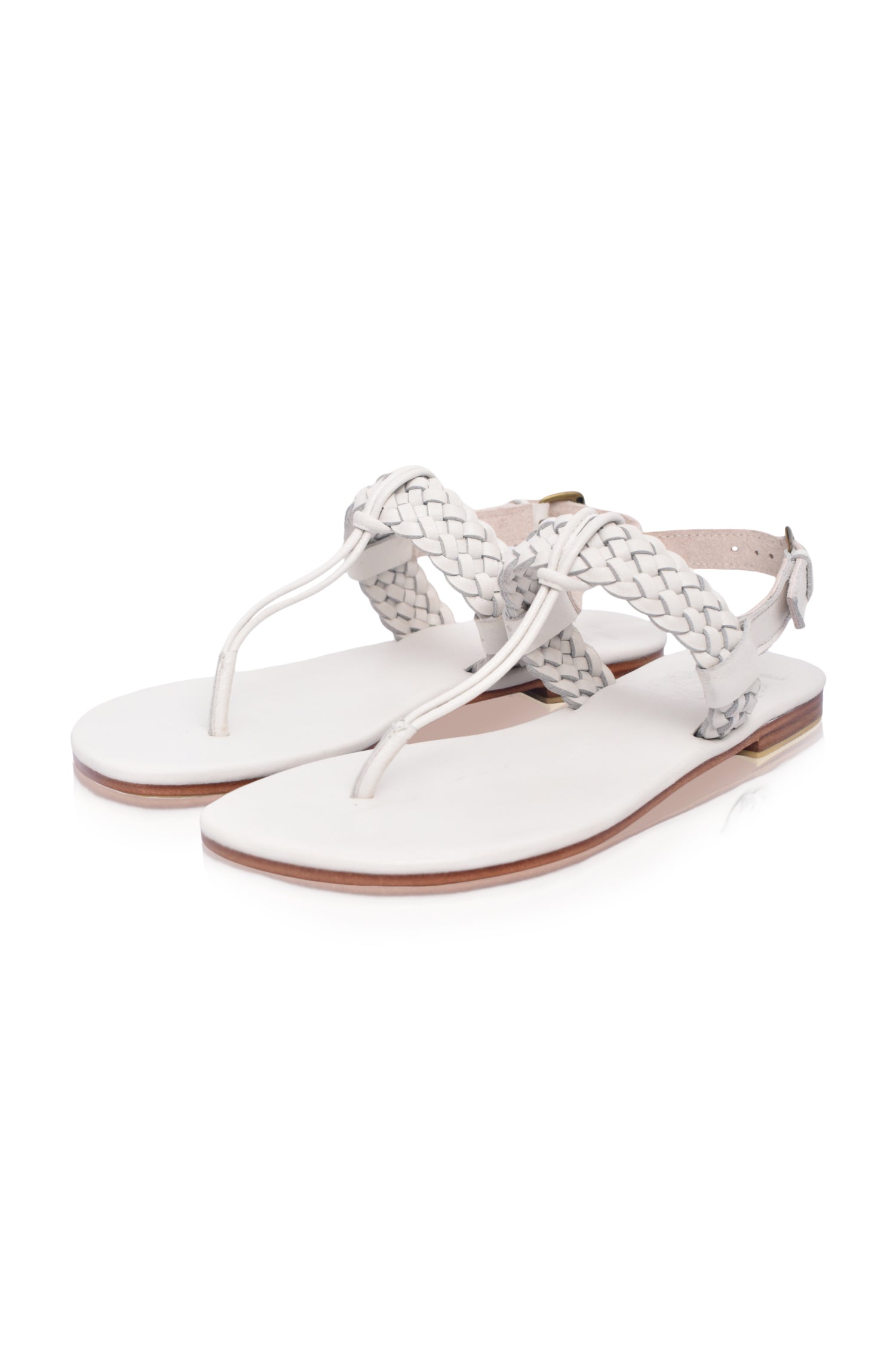 Venetian leather sandals with T-strap design.