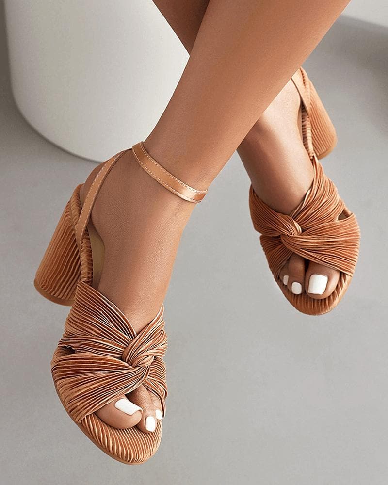 Web celebrity style sandals with adjustable buckle and chunky heel.