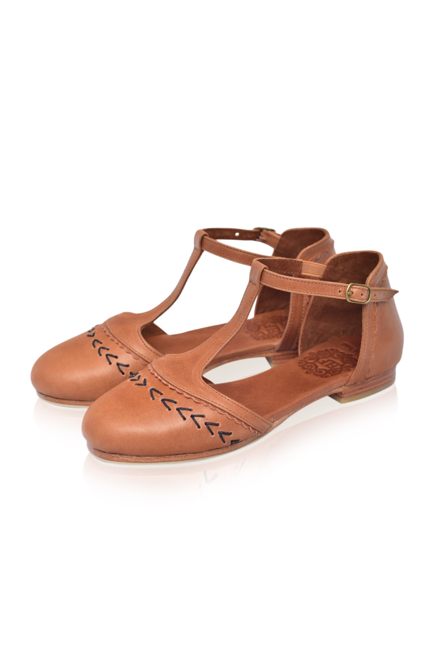 Wonderland T-strap Leather Flats - Google SEO result: Stylish Leather Flats with T-strap - Shop Now for Wonderland Flats!